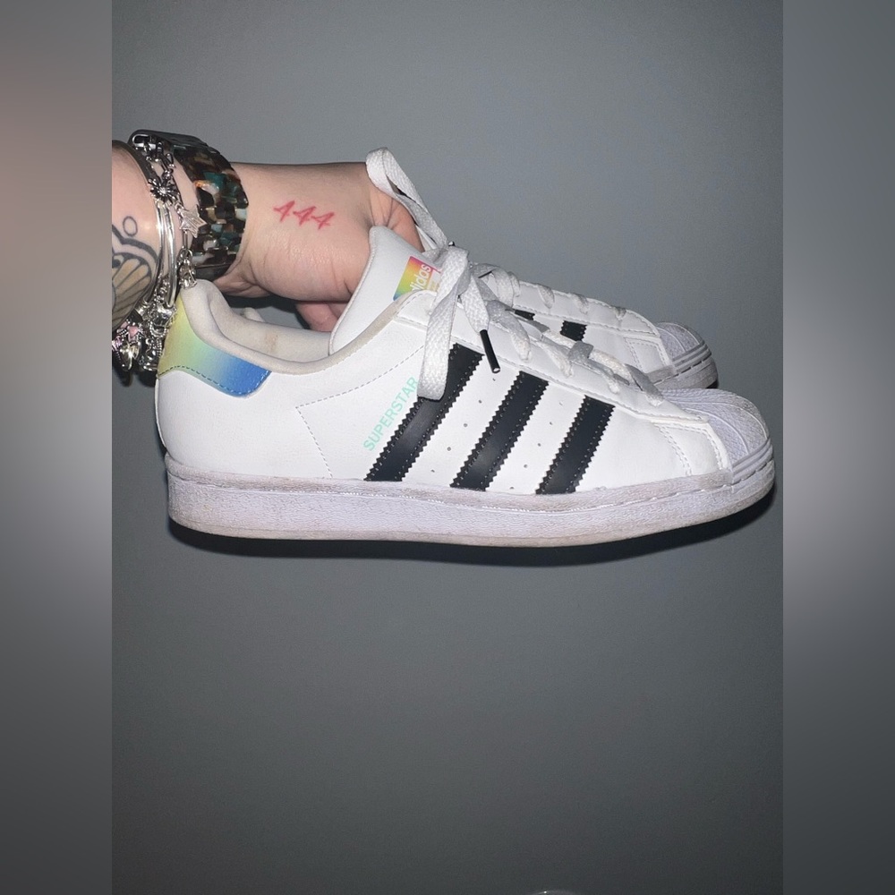 Woman’s adidas rainbow sneakers